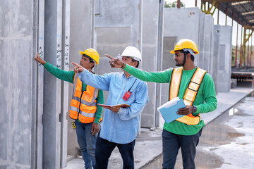 At building construction site supervisor check quality precast concrete panel before installation