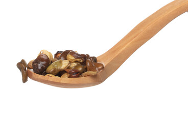 Salt Broad Beans flying explosion, broad bean fall down pour from wooden spoon. Tropical Salty roasted broad bean splash throwing in Air. White background Isolated high speed shutter, freeze action