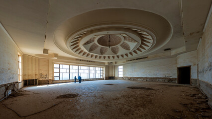 Saddam Hussein Palace in Babylon, Iraq. The bedroom with three people for scale.