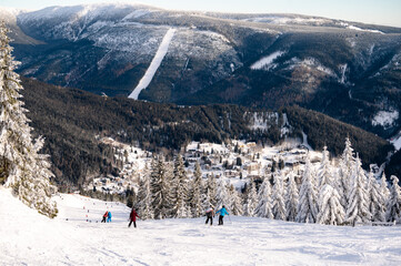 People on mountain in Czech ski resort Spindleruv Mlyn, Czech Rupublic