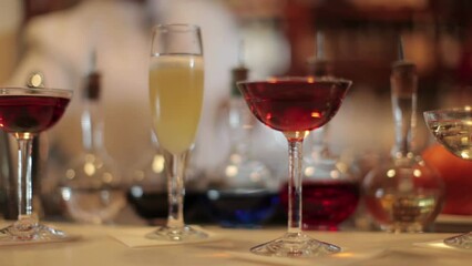 Stylish waiter in cocktail bar 