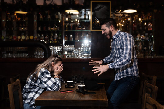 Young Waiter Resigns And Leaves His Job In A Bar Because Of An Argument With The Manager Due To A Low Salary And A Lot Of Responsibilities At Work