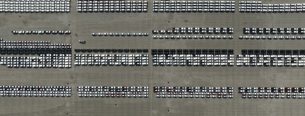 Aerial top view new car lined up in a row