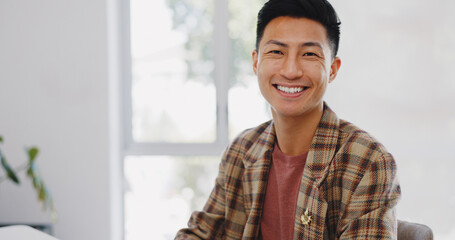 Web design, smile and face of an Asian man on a computer for information technology, website and...