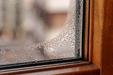 Water condensation on home window glass