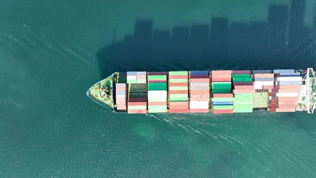Large container ship at sea -Top down view. Aerial top view of cargo container ship vessel import export container sailing.