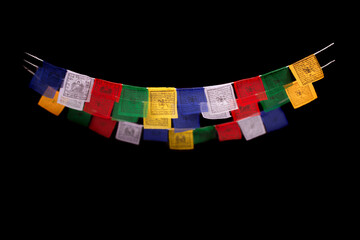 Tibetan prayer flags isolate on black - 568815343