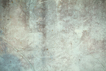 Texture of dirty old cracked concrete wall in blue color.