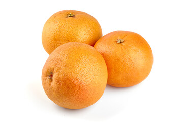 Red grapefruits, isolated on white background.
