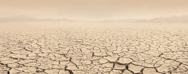 Rugzak Desertification concept landscape. Dried lakebed panorama with sky filled with clouds of dust © ChaoticDesignStudio