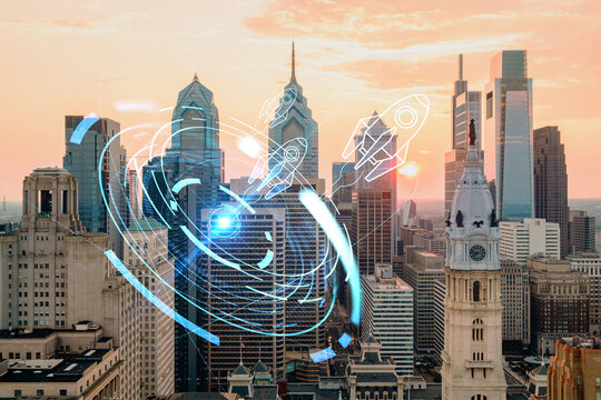 Aerial panoramic skyline of Philadelphia financial downtown, Pennsylvania, USA. City Hall Clock Tower at sunset. Startup company, launch project to seek and develop scalable business model, hologram