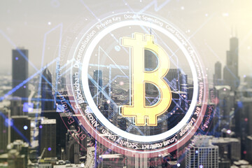 Double exposure of creative Bitcoin symbol hologram on Chicago office buildings background. Mining and blockchain concept