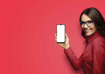 Portrait image of happy smiling young woman in eye glasses spectacles hold show smartphone cell...
