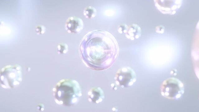 3D animation of liquid drops in the water. A macro shot of many water bubbles rising against a light blue background. super slow motion beautiful glossy Design for moisturizing bubble blobs