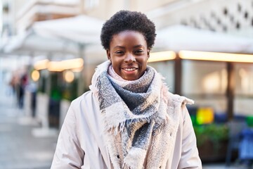 African american woman smiling confident standing at street