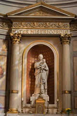 A statue of a saint inside église Saint-Étienne-du-Mont