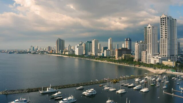 Cityscape of Manila. It is the capital of the Philippines, is a densely populated bayside city on the island of Luzon