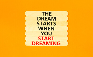 Start dreaming symbol. Concept words The dream starts when you start dreaming on wooden stick....