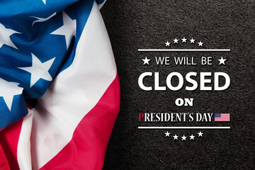 Fototapeta na wymiar President's Day Background Design. American flag on textured black background with a message. We will be Closed on President's Day.