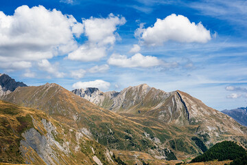 Mountain rock landscape with clouds in the blue sky