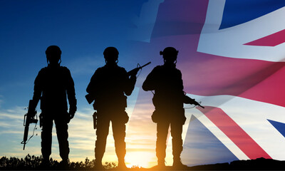 Fototapeta na wymiar Silhouettes of a soldiers with United Kingdom flag on background of sunset. Background for Remembrance Day. United Kingdom Armed Forces concept. EPS10 vector