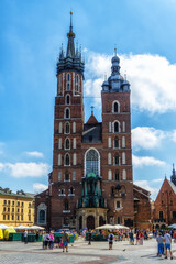 Naklejka na ściany i meble St Mary Basilica in the Main Square of Krakow, Poland.
