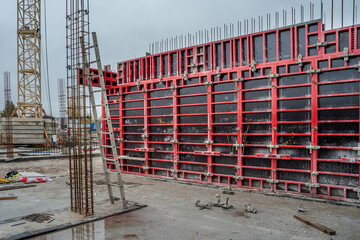 Vertical formwork panels on the construction of a residential building.