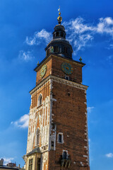 Fototapeta na wymiar Gothic town hall tower with clock in Cracow, Poland