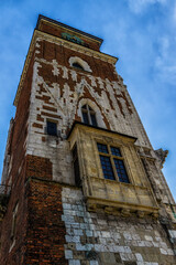 Fototapeta na wymiar Gothic town hall tower with clock in Cracow, Poland