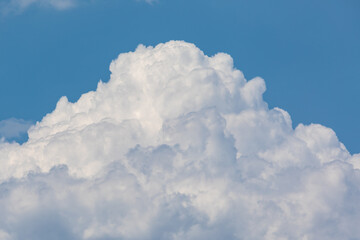 Naklejka na ściany i meble Cumulus clouds on a sunny summer day