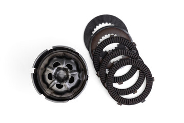 Motorcycle clutch with spare plates isolated on white background.