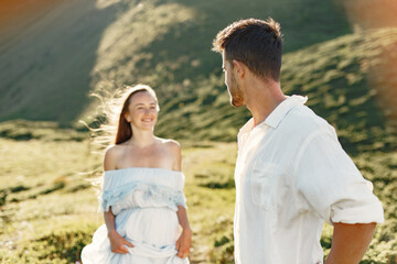 Couple walk in the mountains