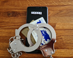 Obraz premium Stealing money from bank card through phone