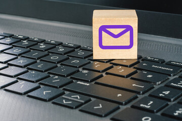 Email icon on dark computer keyboard