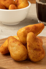 Portion of traditional Brazilian snack coxinha.