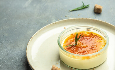 homemade creme brulee with burnt sugar. traditional french vanilla cream dessert. place for text, top view