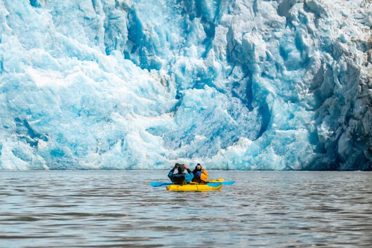 Kayakers near Tracy Arm fjord and South Sawyer Glacier