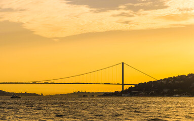 A view on the shores of Bosphorus and 15 July Martyrs Bridge in Istanbul, Turkey