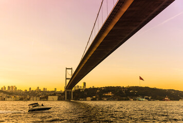 Obraz premium A view on the shores of Bosphorus and 15 July Martyrs Bridge in Istanbul, Turkey