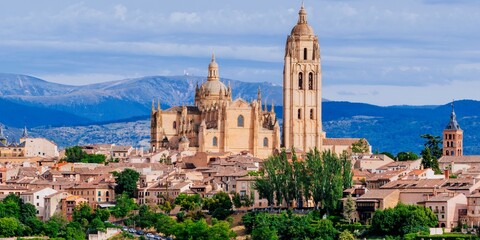 View of the medieval old city surrounded by walls. Highlighting the Cathedral of Segovia. Segovia,...
