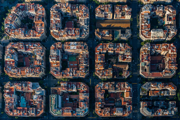 Aerial view of typical buildings of Barcelona cityscape from helicopter. top view, Eixample...