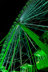 Fototapeta premium photograph of Ferris wheel illuminated at night
