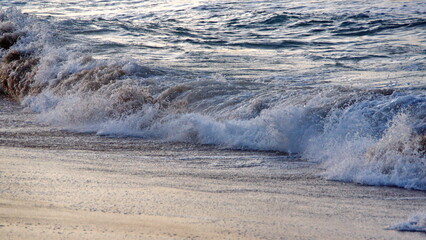 Waves breaking on the beach in Zipolite, Mexico