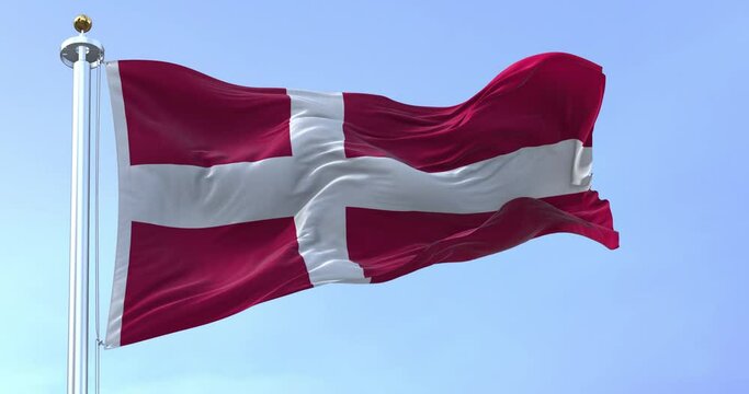 Denmark national flag waving in the wind on a clear day.