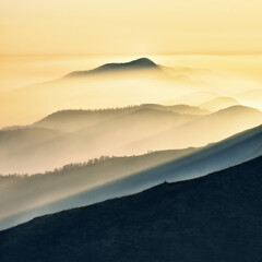 Fototapeta na wymiar silhouettes of morning mountains. foggy morning in the Carpathians. Mountain landscape