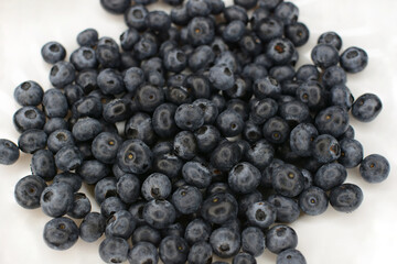 Blueberries on a beautiful white plate
