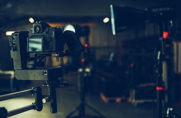 Digital Video Camera Attached to Automatic Jib Arm Inside a Studio
