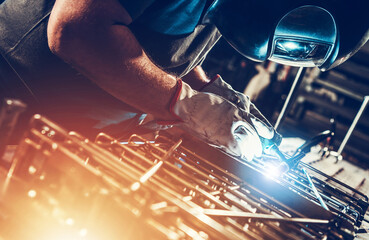 Metalworking Worker Welding Metal Pieces