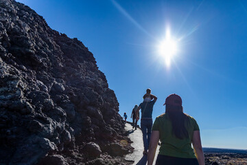 Family visits Craters of Moon National Monument 