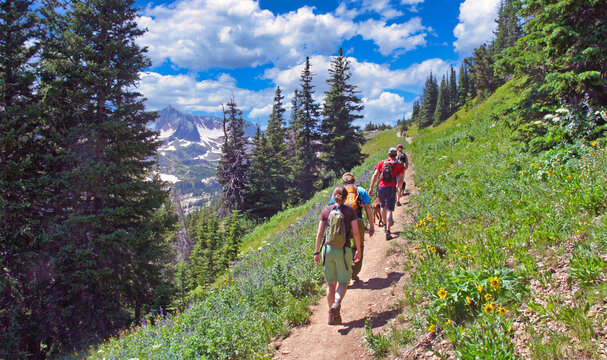 Group of hikers heading up the Arapaho Pass Trail in Boulder County, Colorado's Indian Peaks Wilderness